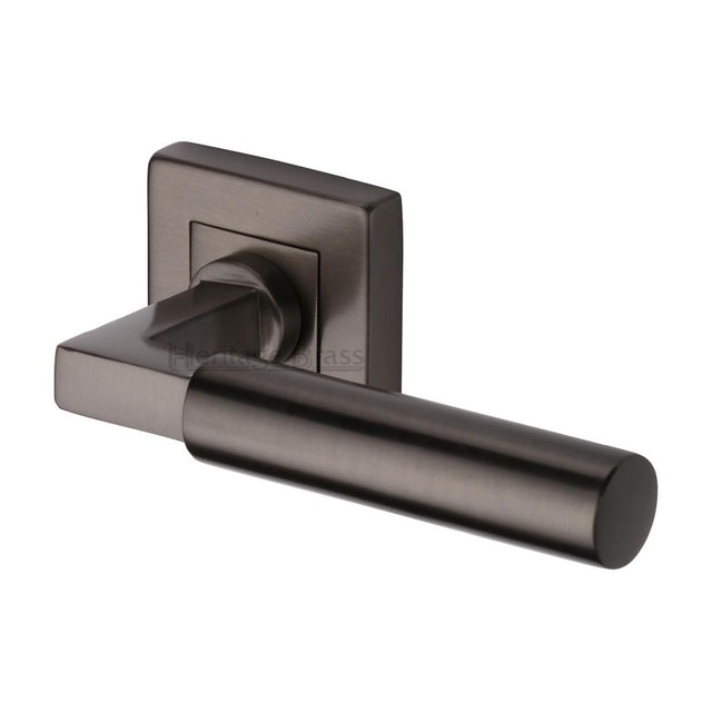 This is an image of a Heritage Brass - Door Handle Lever on Rose Bauhaus Sq Design Matt Bronze Finish, sq1926-mb that is available to order from T.H Wiggans Ironmongery in Kendal.