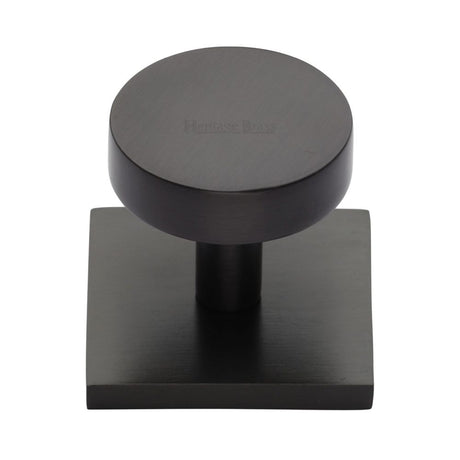 This is an image of a Heritage Brass - Cabinet Knob Disc Design with Square Backplate 32mm Matt Bronze, sq3880-mb that is available to order from T.H Wiggans Ironmongery in Kendal.