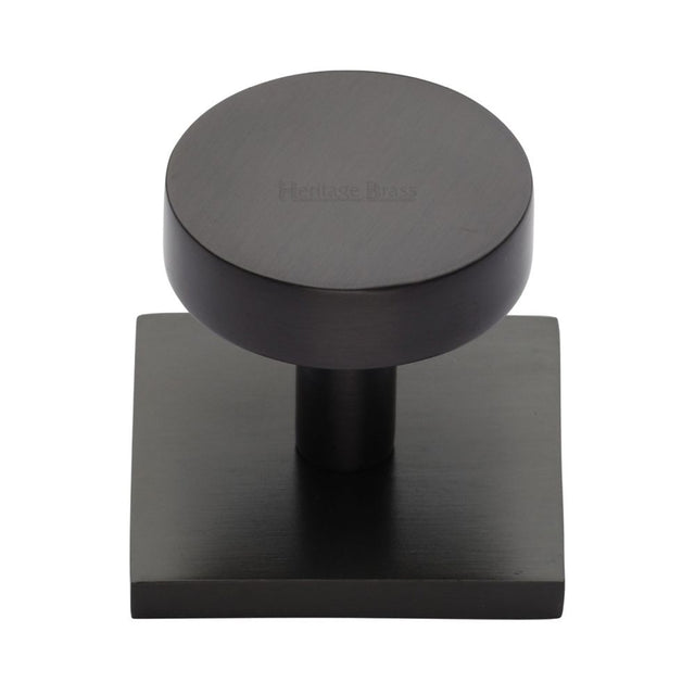 This is an image of a Heritage Brass - Cabinet Knob Disc Design with Square Backplate 32mm Matt Bronze, sq3880-mb that is available to order from T.H Wiggans Ironmongery in Kendal.