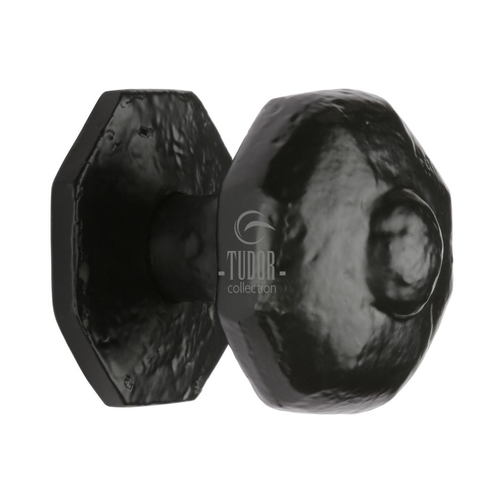 This is an image of a The Tudor Collection - Octagon Centre Door Knob Black Iron, tc350 that is available to order from T.H Wiggans Ironmongery in Kendal.