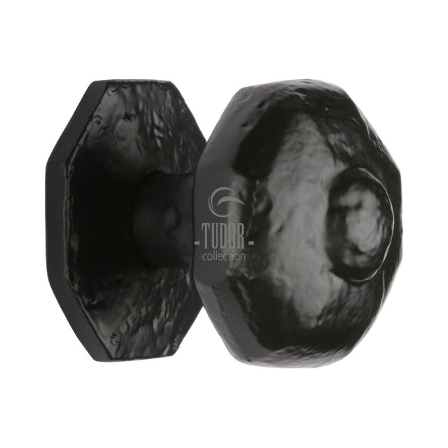 This is an image of a The Tudor Collection - Octagon Centre Door Knob Black Iron, tc350 that is available to order from T.H Wiggans Ironmongery in Kendal.