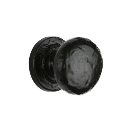 This is an image of a The Tudor Collection - Cabinet Knob Rustic Round Design 25mm Black Iron, tc532-25 that is available to order from T.H Wiggans Ironmongery in Kendal.