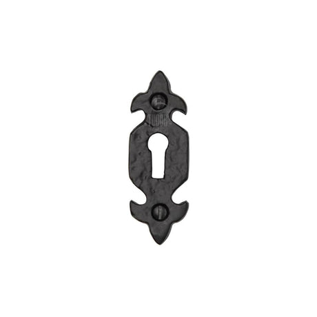 This is an image of a The Tudor Collection - Keyhole Escutcheon Black Iron, tc545 that is available to order from T.H Wiggans Ironmongery in Kendal.