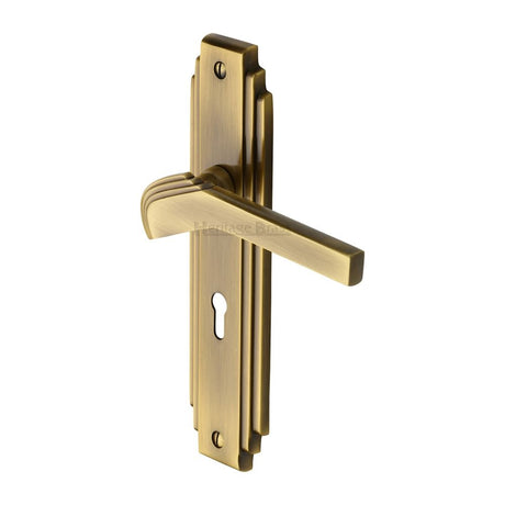 This is an image of a Heritage Brass - Door Handle Lever Lock Tiffany Design Antique Brass Finish, tif5200-at that is available to order from T.H Wiggans Ironmongery in Kendal.