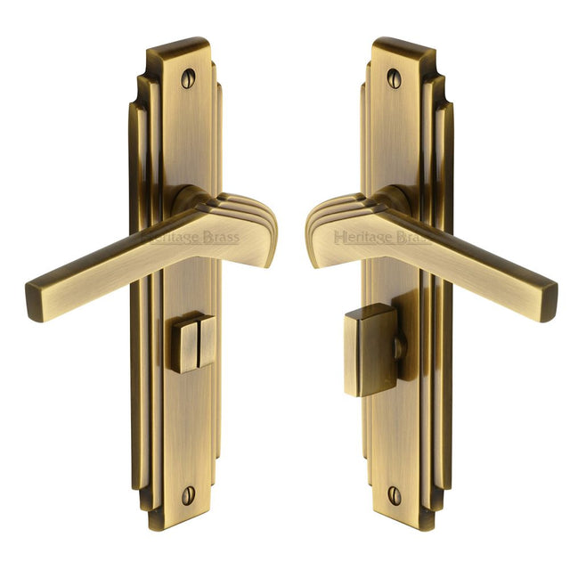 This is an image of a Heritage Brass - Door Handle Bathroom Set Tiffany Design Antique Brass Finish, tif5230-at that is available to order from T.H Wiggans Ironmongery in Kendal.