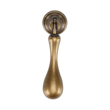 This is an image of a M.Marcus - Classic Drop Pull 053mm Distressed Brass Finish, tk1396-053-dbs that is available to order from T.H Wiggans Ironmongery in Kendal.