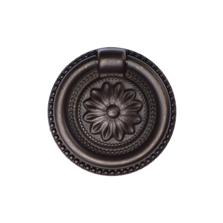 This is an image of a M.Marcus - Floral Ring Pull 047mm Matt Bronze Finish, tk2224-047-lbn that is available to order from T.H Wiggans Ironmongery in Kendal.