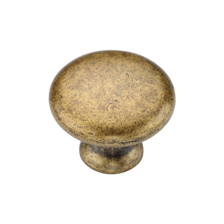 This is an image of a M.Marcus - Classic Round Knob 030mm Distressed Brass Finish, tk4226-030-dbs that is available to order from T.H Wiggans Ironmongery in Kendal.