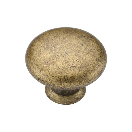 This is an image of a M.Marcus - Classic Round Knob 035mm Distressed Brass Finish, tk4226-035-dbs that is available to order from T.H Wiggans Ironmongery in Kendal.