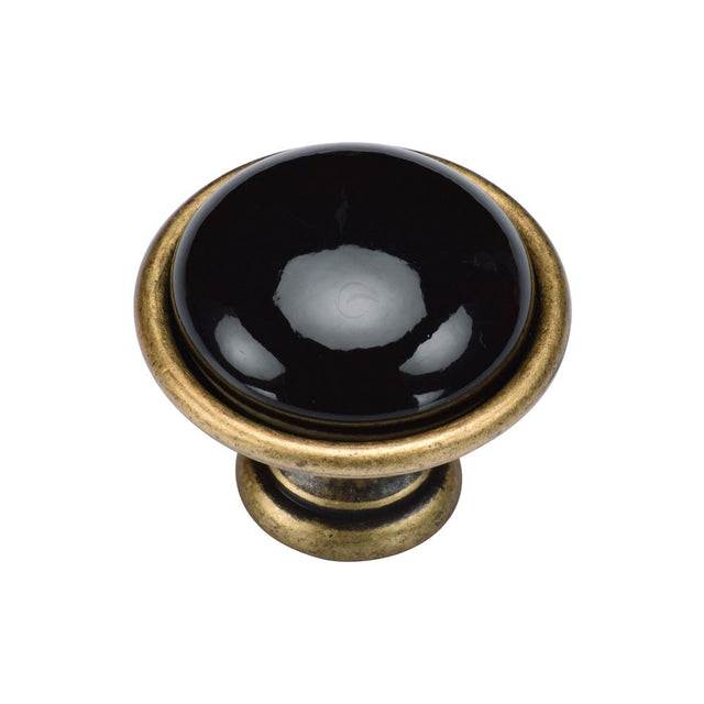 This is an image of a M.Marcus - Dome Cabinet Knob 035mm Distressed Brass Finish, tk4316-035-dbs that is available to order from T.H Wiggans Ironmongery in Kendal.