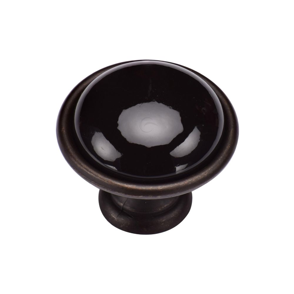 This is an image of a M.Marcus - Dome Cabinet Knob 035mm Matt Bronze Finish, tk4316-035-lbn that is available to order from T.H Wiggans Ironmongery in Kendal.