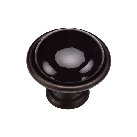 This is an image of a M.Marcus - Dome Cabinet Knob 035mm Matt Bronze Finish, tk4316-035-lbn that is available to order from T.H Wiggans Ironmongery in Kendal.