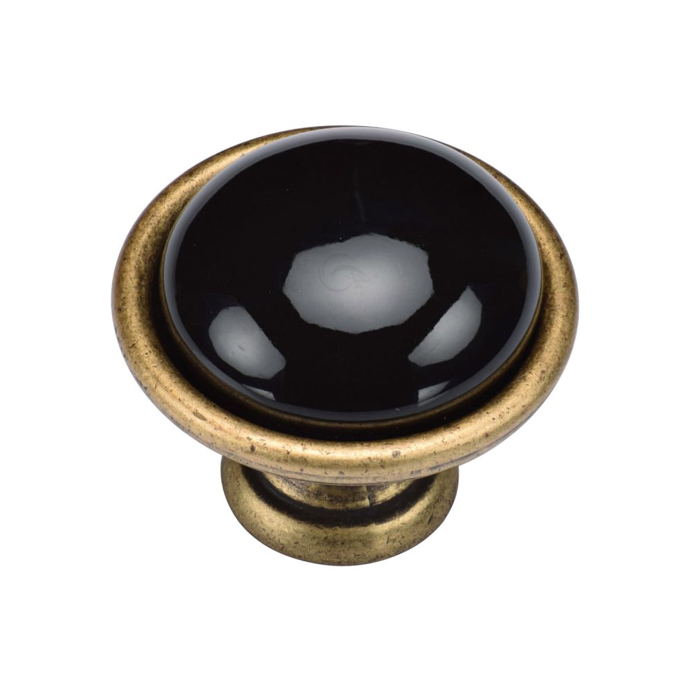 This is an image of a M.Marcus - Dome Cabinet Knob 040mm Distressed Brass Finish, tk4316-040-dbs that is available to order from T.H Wiggans Ironmongery in Kendal.