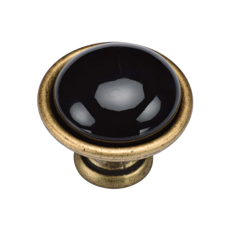 This is an image of a M.Marcus - Dome Cabinet Knob 040mm Distressed Brass Finish, tk4316-040-dbs that is available to order from T.H Wiggans Ironmongery in Kendal.