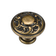 This is an image of a M.Marcus - Decorated Round Knob 035mm Distressed Brass Finish, tk4401-035-dbs that is available to order from T.H Wiggans Ironmongery in Kendal.