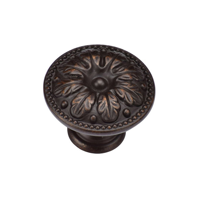 This is an image of a M.Marcus - Floral Round Knob 030mm Matt Bronze Finish, tk4479-030-lbn that is available to order from T.H Wiggans Ironmongery in Kendal.