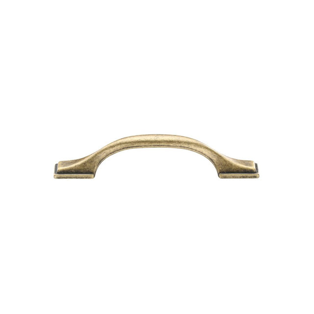 This is an image of a M.Marcus - Luca Cabinet Pull 96mm Distressed Brass Finish, tk5090-096-dbs that is available to order from T.H Wiggans Ironmongery in Kendal.