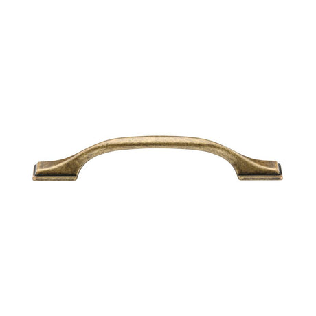 This is an image of a M.Marcus - Luca Cabinet Pull 128mm Distressed Brass Finish, tk5090-128-dbs that is available to order from T.H Wiggans Ironmongery in Kendal.