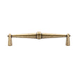 This is an image of a M.Marcus - Terre Cabinet Pull 160mm Distressed Brass Finish, tk5231-160-dbs that is available to order from T.H Wiggans Ironmongery in Kendal.
