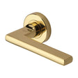 This is an image of a Heritage Brass - Door Handle Lever Latch on Round Rose Trident Design Polished Brass, tri1352-pb that is available to order from T.H Wiggans Ironmongery in Kendal.