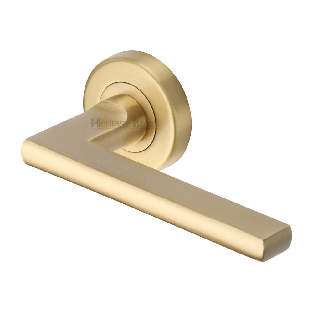 This is an image of a Heritage Brass - Door Handle Lever Latch on Round Rose Trident Design Satin Brass, tri1352-sb that is available to order from T.H Wiggans Ironmongery in Kendal.