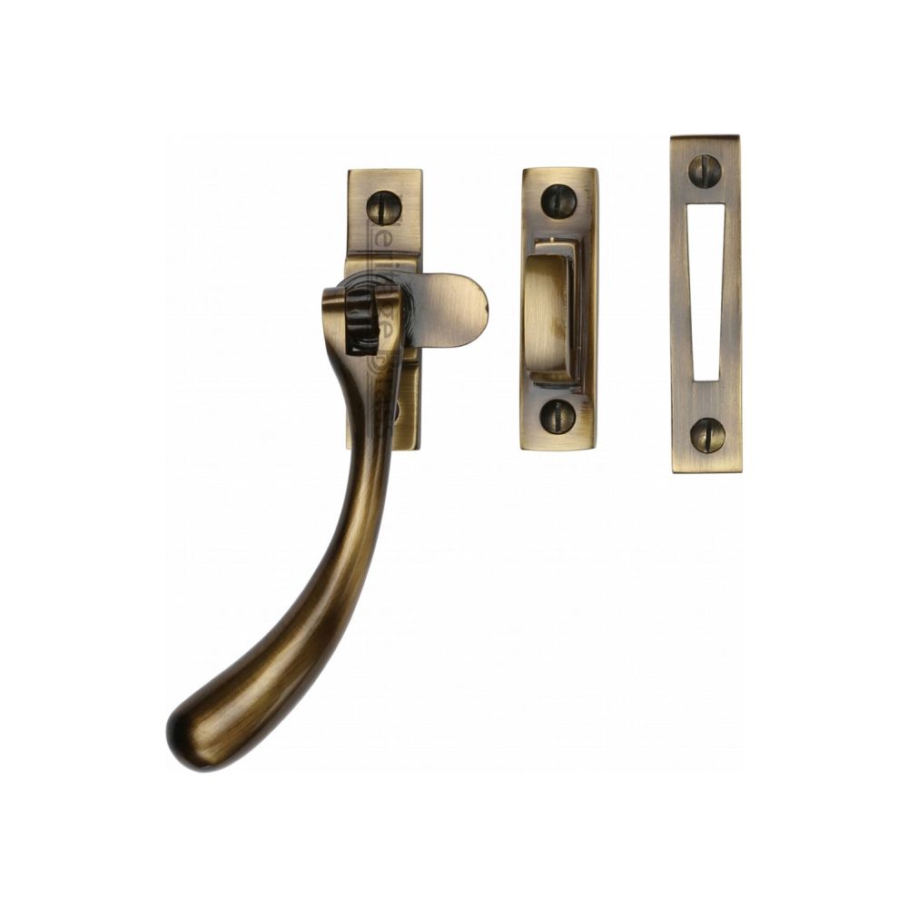 This is an image of a Heritage Brass - Casement Window Fastener Ball Design Antique Brass Finish, v1008-mp-hp-at that is available to order from T.H Wiggans Ironmongery in Kendal.