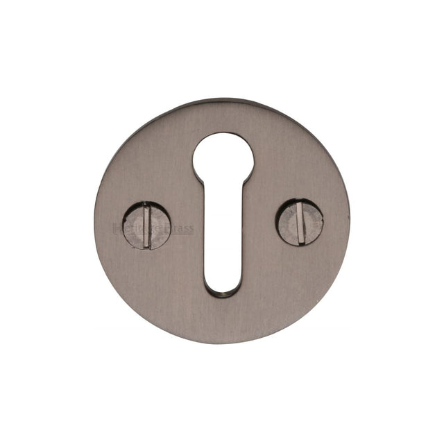 This is an image of a Heritage Brass - Keyhole Escutcheon Matt Bronze Finish, v1010-mb that is available to order from T.H Wiggans Ironmongery in Kendal.