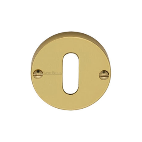 This is an image of a Heritage Brass - Keyhole Escutcheon Polished Brass Finish, v1014-pb that is available to order from T.H Wiggans Ironmongery in Kendal.