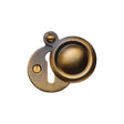 This is an image of a Heritage Brass - Covered Keyhole Round Antique Brass Finish, v1020-at that is available to order from T.H Wiggans Ironmongery in Kendal.