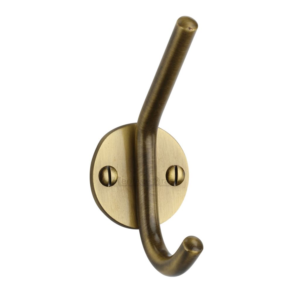 This is an image of a Heritage Brass - Hat & Coat Hook Antique Brass Finish, v1065-at that is available to order from T.H Wiggans Ironmongery in Kendal.