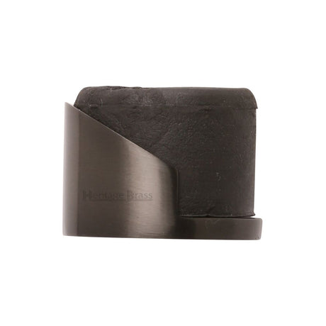 This is an image of a Heritage Brass - Door Stop Round Floor Mounted Design Matt Bronze Finish, v1088-mb that is available to order from T.H Wiggans Ironmongery in Kendal.