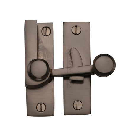 This is an image of a Heritage Brass - Sash Fastener Matt Bronze Finish, v1100-mb that is available to order from T.H Wiggans Ironmongery in Kendal.