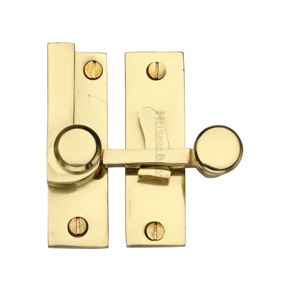 This is an image of a Heritage Brass - Sash Fastener Polished Brass Finish, v1100-pb that is available to order from T.H Wiggans Ironmongery in Kendal.