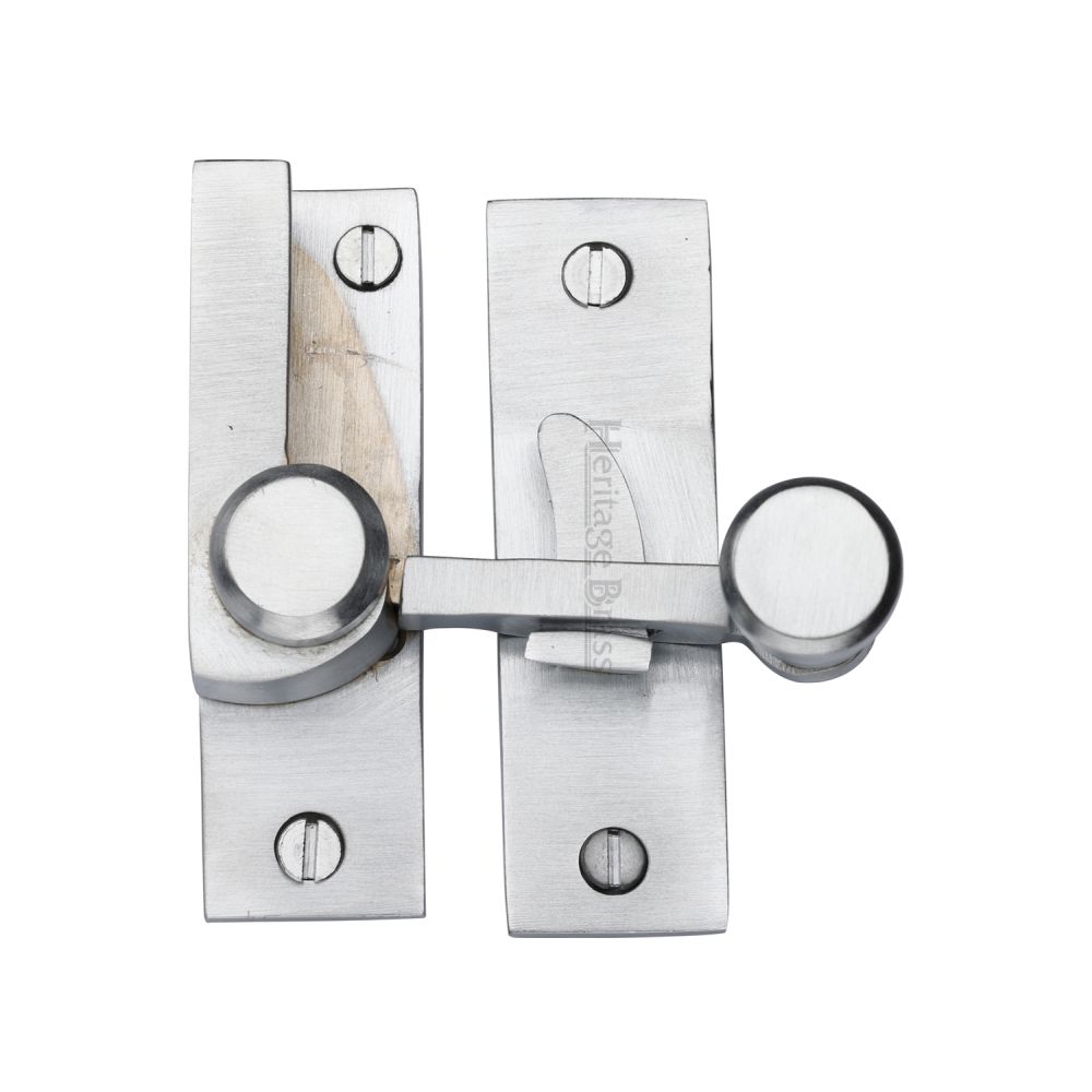 This is an image of a Heritage Brass - Sash Fastener Satin Chrome Finish, v1100-sc that is available to order from T.H Wiggans Ironmongery in Kendal.