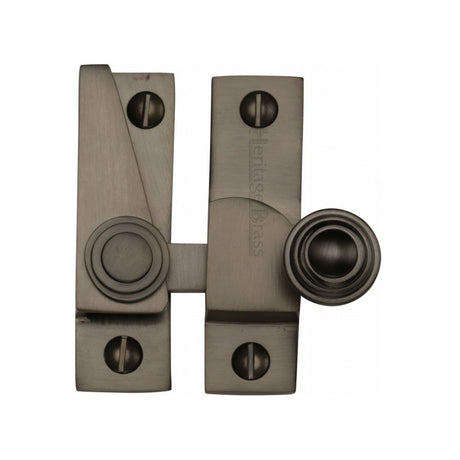 This is an image of a Heritage Brass - Sash Fastener Matt Bronze Finish, v1104-mb that is available to order from T.H Wiggans Ironmongery in Kendal.