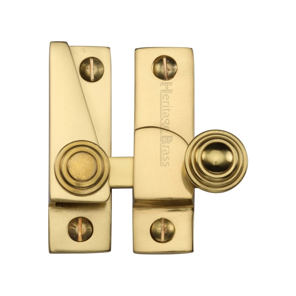 This is an image of a Heritage Brass - Sash Fastener Polished Brass Finish, v1104-pb that is available to order from T.H Wiggans Ironmongery in Kendal.