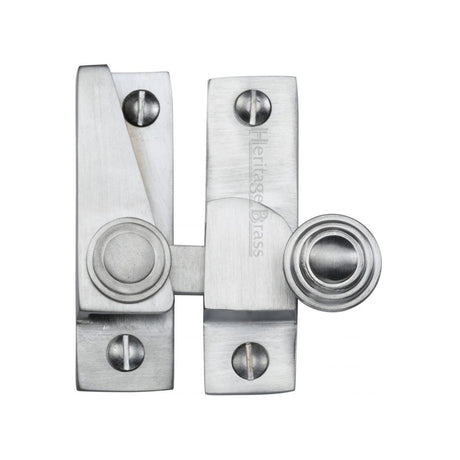 This is an image of a Heritage Brass - Sash Fastener Satin Chrome Finish, v1104-sc that is available to order from T.H Wiggans Ironmongery in Kendal.
