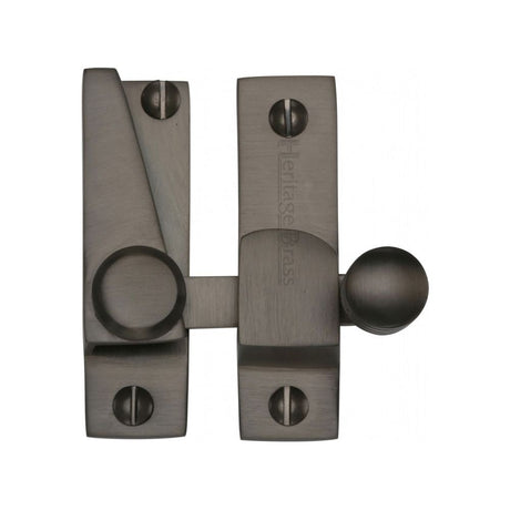 This is an image of a Heritage Brass - Sash Fastener Matt Bronze Finish, v1105-mb that is available to order from T.H Wiggans Ironmongery in Kendal.