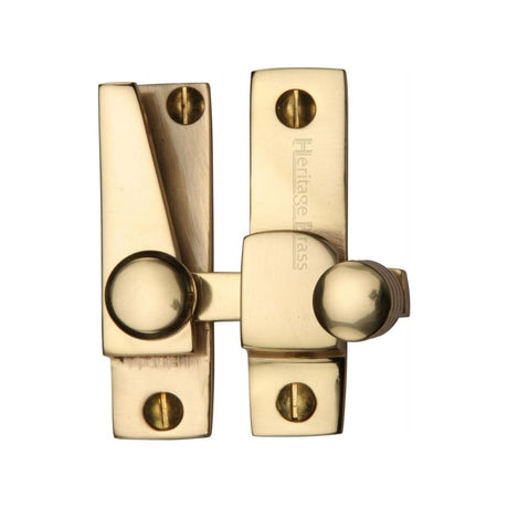 This is an image of a Heritage Brass - Sash Fastener Polished Brass Finish, v1105-pb that is available to order from T.H Wiggans Ironmongery in Kendal.