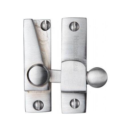 This is an image of a Heritage Brass - Sash Fastener Satin Chrome Finish, v1105-sc that is available to order from T.H Wiggans Ironmongery in Kendal.