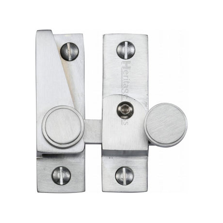 This is an image of a Heritage Brass - Sash Fastener Lockable Satin Chrome Finish, v1106l-sc that is available to order from T.H Wiggans Ironmongery in Kendal.