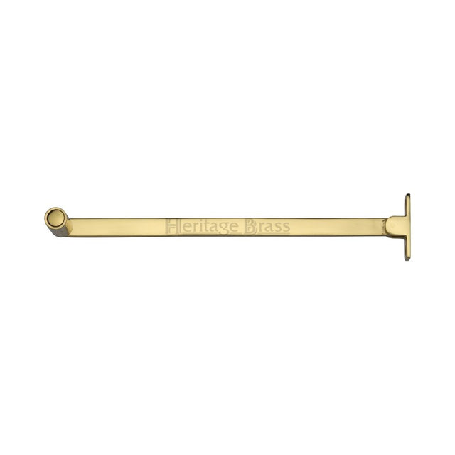 This is an image of a Heritage Brass - Roller Arm Stay 254mm Polished Brass Finish, v1119-10-pb that is available to order from T.H Wiggans Ironmongery in Kendal.