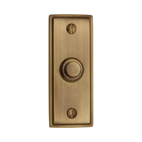 This is an image of a Heritage Brass - Bell Push 3" x 1" Antique Brass Finish, v1180-at that is available to order from T.H Wiggans Ironmongery in Kendal.