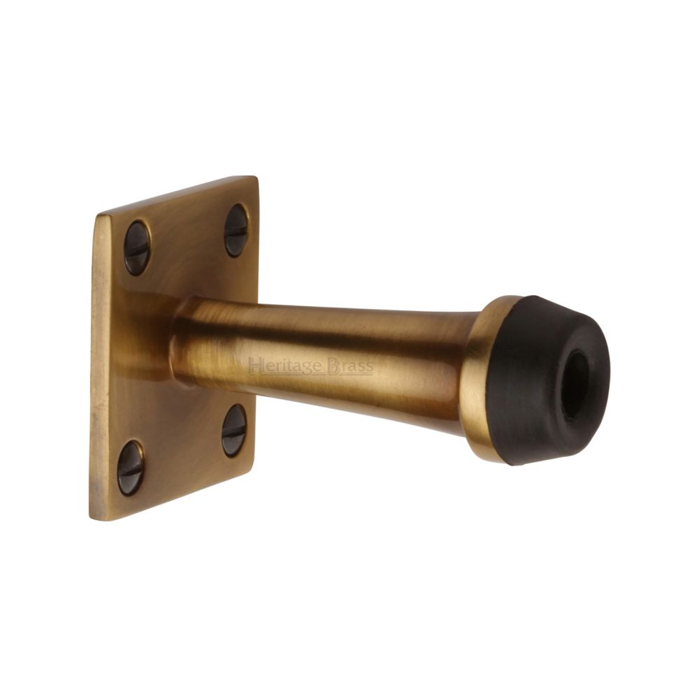 This is an image of a Heritage Brass - Wall Mounted Door Stop 3" Antique Brass Finish, v1190-76-at that is available to order from T.H Wiggans Ironmongery in Kendal.