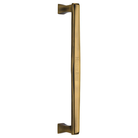 This is an image of a Heritage Brass - Door Pull Handle Deco Design 305mm Antique Brass Finish, v1334-305-at that is available to order from T.H Wiggans Ironmongery in Kendal.