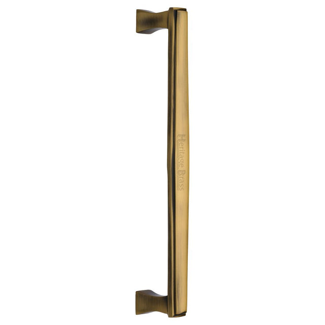 This is an image of a Heritage Brass - Door Pull Handle Deco Design 305mm Antique Brass Finish, v1334-305-at that is available to order from T.H Wiggans Ironmongery in Kendal.