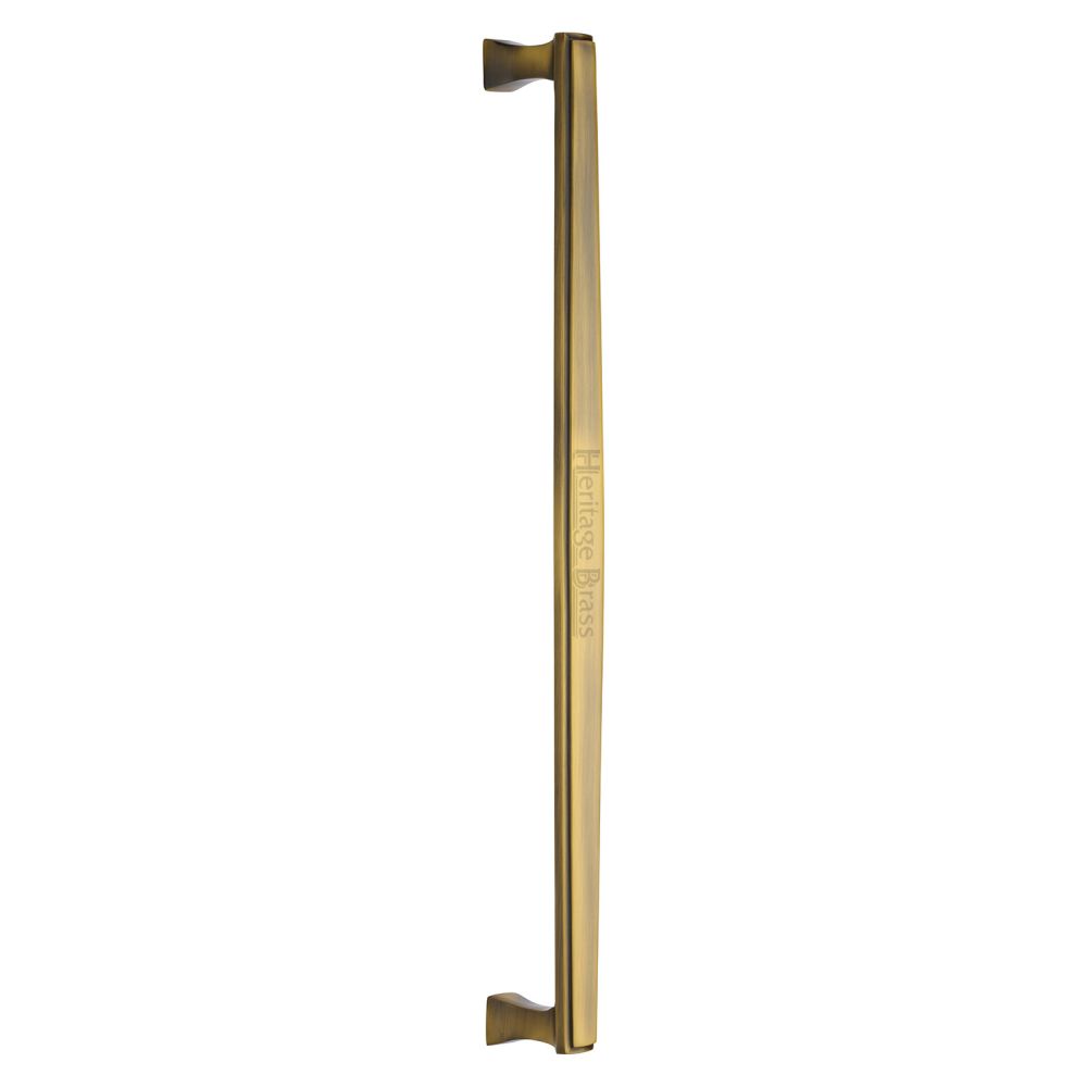 This is an image of a Heritage Brass - Door Pull Handle Deco Design 457mm Antique Brass Finish, v1334-457-at that is available to order from T.H Wiggans Ironmongery in Kendal.