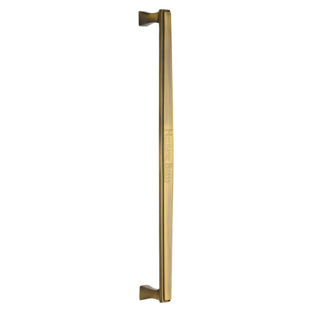 This is an image of a Heritage Brass - Door Pull Handle Deco Design 457mm Antique Brass Finish, v1334-457-at that is available to order from T.H Wiggans Ironmongery in Kendal.