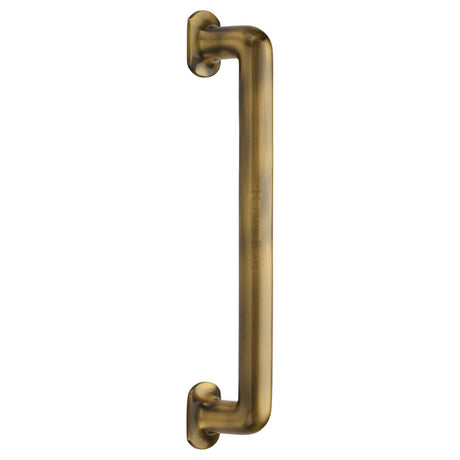 This is an image of a Heritage Brass - Door Pull Handle Traditional Design 330mm Antique Brass Finish, v1376-330-at that is available to order from T.H Wiggans Ironmongery in Kendal.