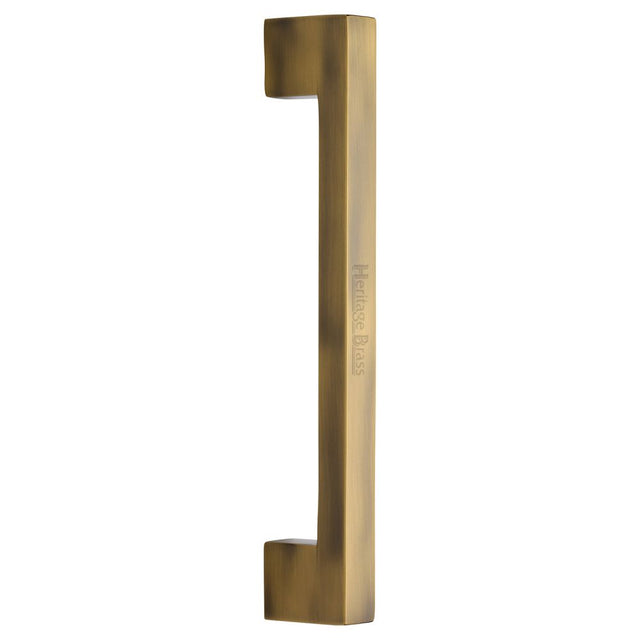 This is an image of a Heritage Brass - Door Pull Handle Urban Design 305mm Antique Brass Finish, v1390-305-at that is available to order from T.H Wiggans Ironmongery in Kendal.